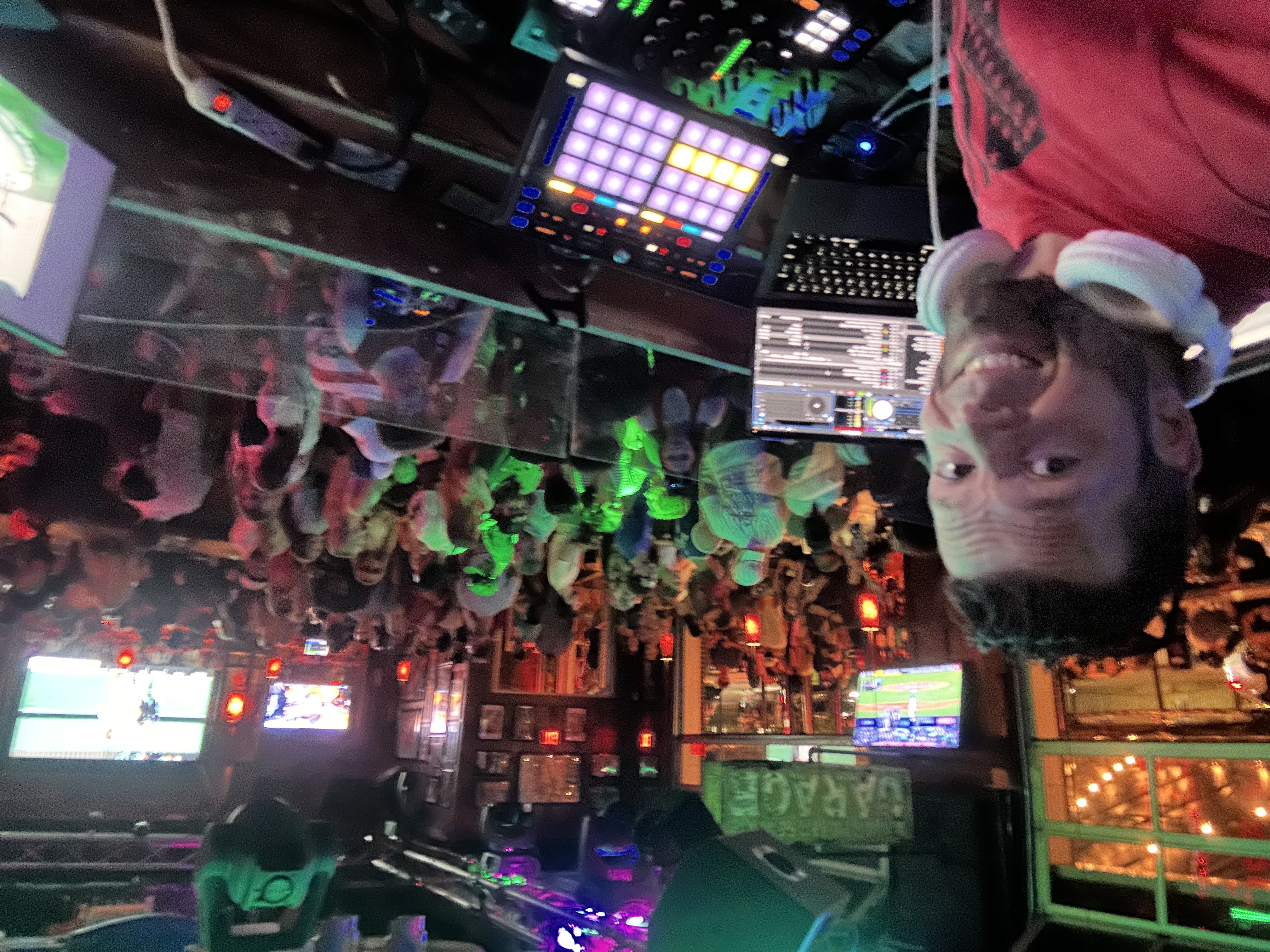 DJ Kyle Mac selfie from nightclub DJ booth with packed crowd